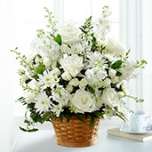 Large white bouquet in wicker basket