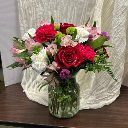 Pretty Pinks bouquet in glass vase